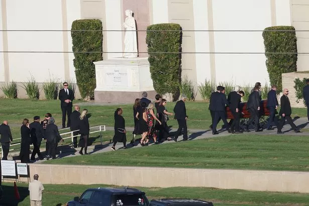 actors at funeral