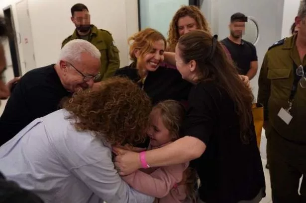 Tearful families are reunited with hostages