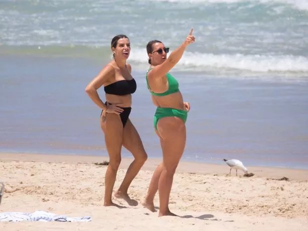 Rachael Bellew enjoys a windy day on the beach with her family