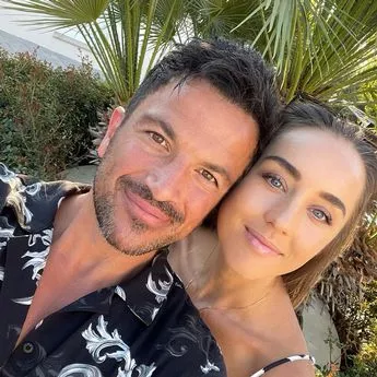 Peter Andre and his wife Emily MacDonagh posing together for a selfie