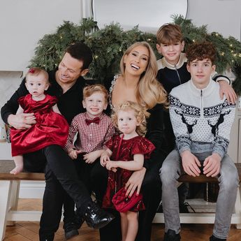 Stacey Solomon, Joe Swash and their family posing for a festive photo together