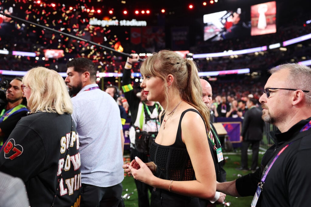 Taylor Swift on the field after the 2024 Super Bowl.