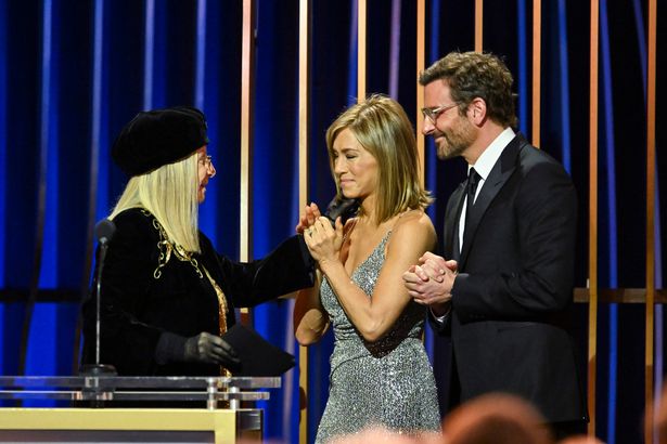 Jennifer and Bradley Cooper presented an award to Barbra Streisand during the ceremony