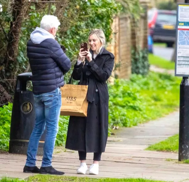 Molly stopped to take a photo of her dad and his new pet