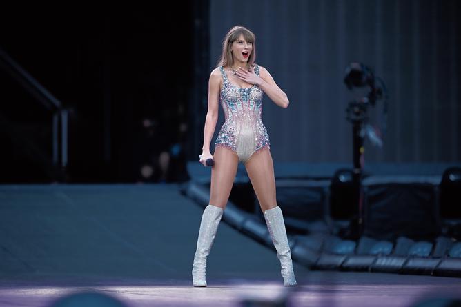 American singer songwriter Taylor Swift performing during the first night of the The Eras Tour in Australia at the Melbourne Cricket Ground, Melbourne, Friday, February 16, 2024. Taylor Swift's Eras Tour has descended on Melbourne, with the pop megastar expected to perform in front of the biggest crowds of her career so far. (AAP Image/Joel Carrett) NO ARCHIVING, EDITORIAL USE ONLY, NO COMMERCIAL USE, NO PUBLICATION COVERS