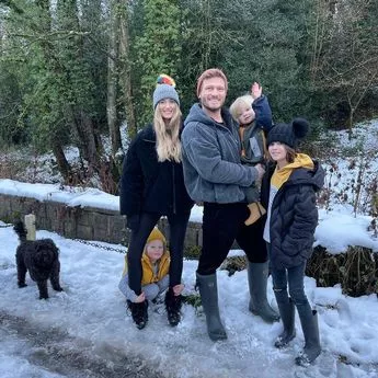 Charley Webb, Matthew Wolfenden and their family in a photo once shared with fans