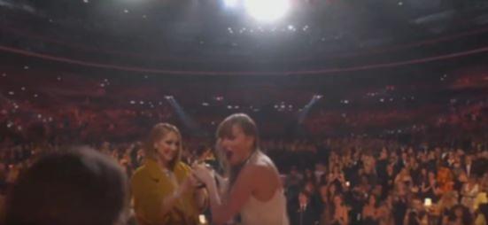 When it comes time to receive the award from the legendary Canadian singer, Swift barely looks at Dion as she takes the Grammy from her hands.