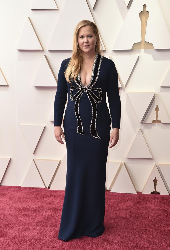 Amy Schumer arrives at the Oscars on Sunday, March 27, 2022, at the Dolby Theatre in Los Angeles. (Photo by Jordan Strauss/Invision/AP)