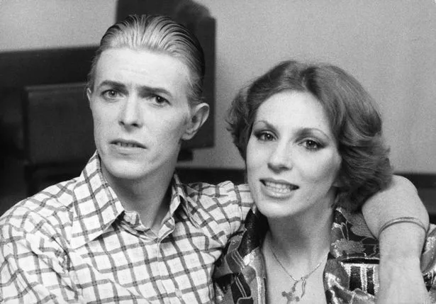 David Bowie wih his wife Angie during a visit to London in 1976