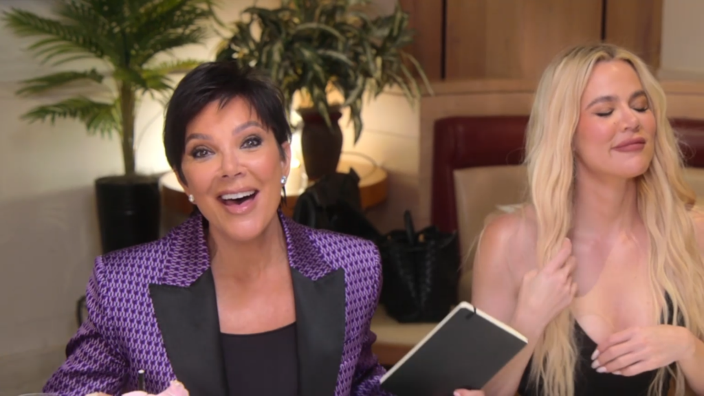 Kris Jenner wears a purple blazer while seated next to Khloe.