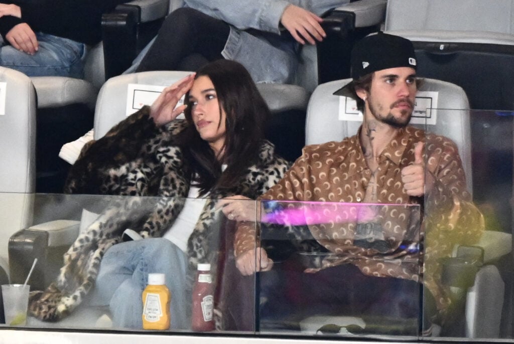 Justin Bieber and Hailey Bieber watch the 2024 Super Bowl.