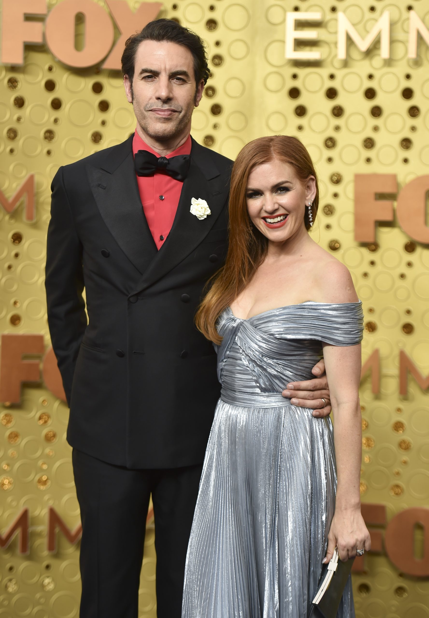 Sacha Baron Cohen and Isla Fisher (Photo by WWD/Penske Media via Getty Images)