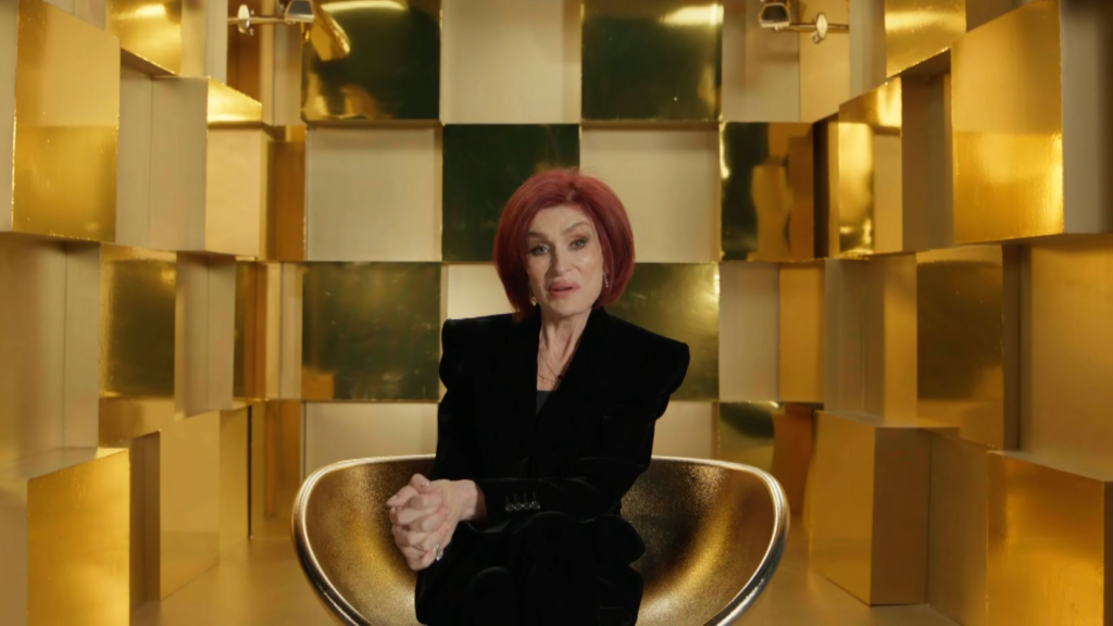 Sharon Osbourne surrounded by glittering gold on Celebrity Big Brother: UK in 2024.