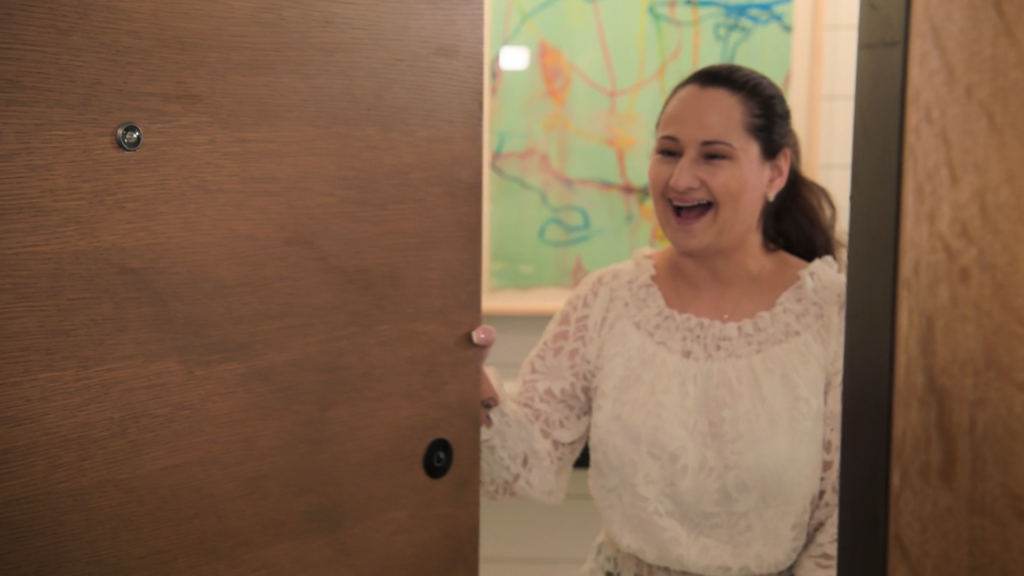 Gypsy-Rose Blanchard answers the door.