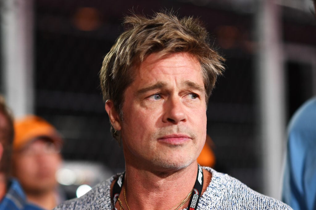 Brad Pitt, star of the upcoming Formula One based movie, Apex, walks in the Pitlane prior to qualifying ahead of the F1 Grand Prix of Las Vegas at Las Vegas Strip Circuit on November 17, 2023 in Las Vegas, Nevada. 