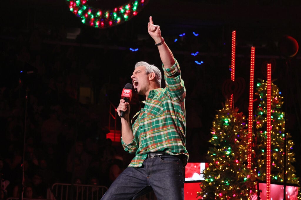 Andy Cohen on a stage