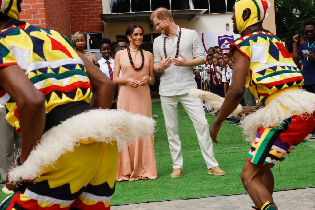 Prince Harry, Duke of Sussex and Meghan, Duchess of Sussex visit Lightway Academy on May 10, 2024 in Abuja, Nigeria.