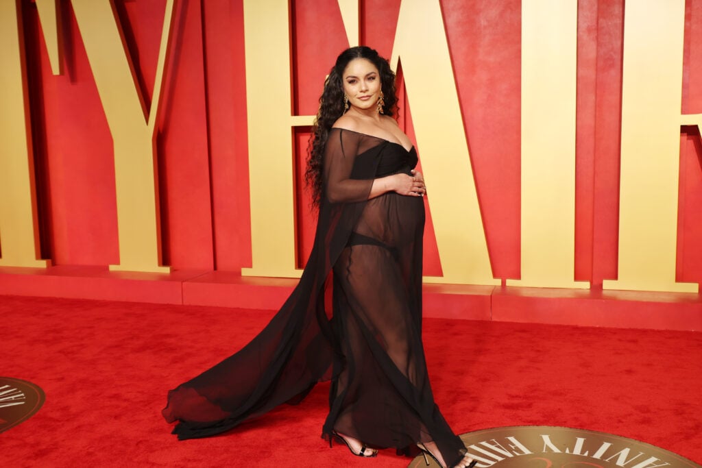 Vanessa Hudgens showing off her pregnant baby bump in March of 2024.