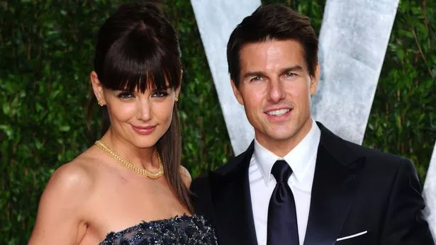 Katie Holmes (L) and actor Tom Cruise