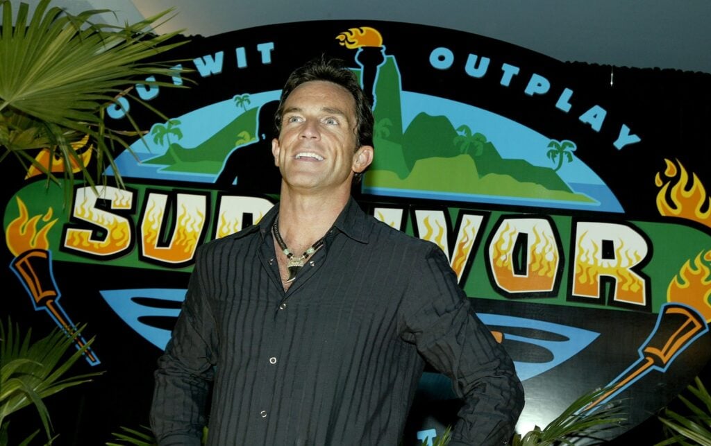 Jeff Probst poses for photos after the Survivor All-stars Finale