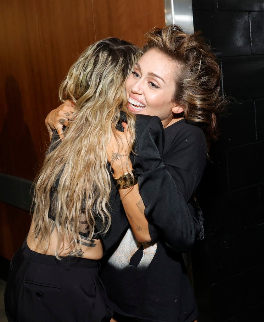 Miley Cyrus and Tish Cyrus embrace on February 4, 2024.