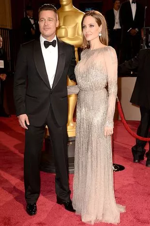 Actor Brad Pitt and actress Angelina Jolie attend the Oscars held at Hollywood & Highland Center on March 2, 2014 in Hollywood, California.