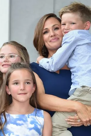 Actress Jennifer Garner poses with her children Violet Affleck, Seraphina Rose Elizabeth Affleck and Samuel Garner Affleck