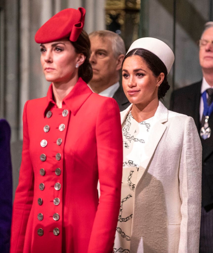 Catherine, The Duchess of Cambridge stands with Meghan, Duchess of Sussex at Westminster Abbey for a Commonwealth day service on March 11, 2019 in London, England.  