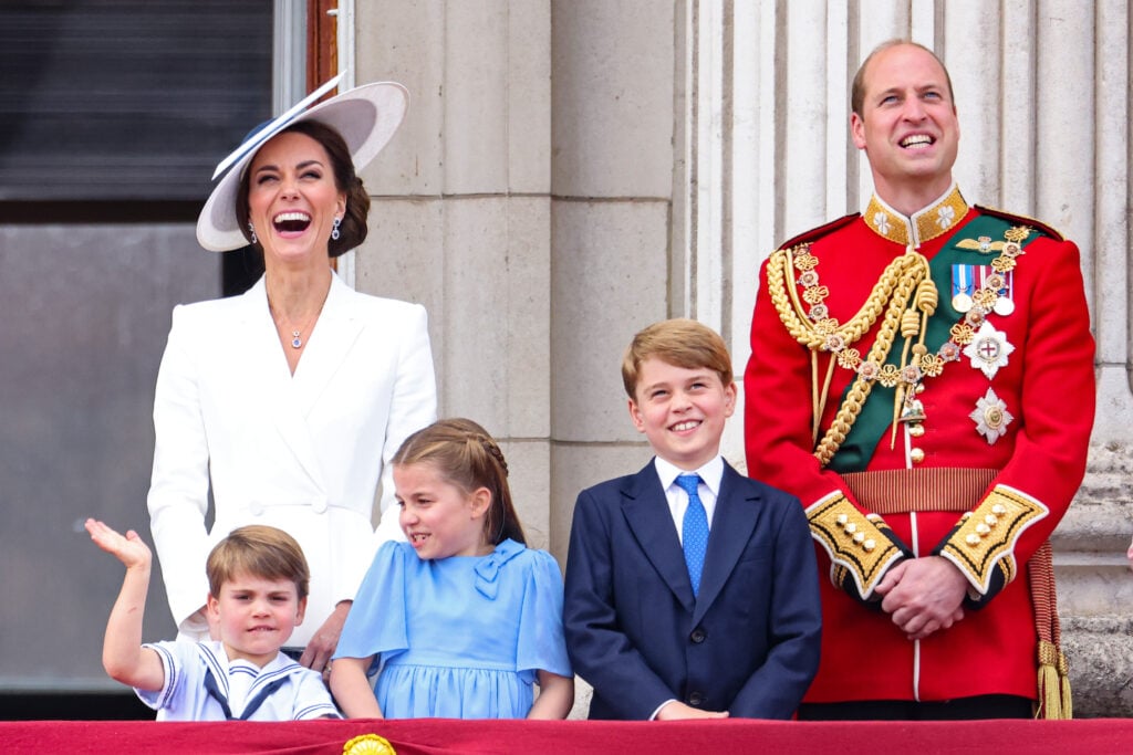 Prince Louis of Cambridge, Catherine, Duchess of Cambridge, Princess Charlotte of Cambridge, Prince George of Cambridge and Prince William, Duke of Cambridge watch the RAF flypast on the balcony of Buckingham Palace during the Trooping the Colour parade on June 02, 2022 in London, England. 