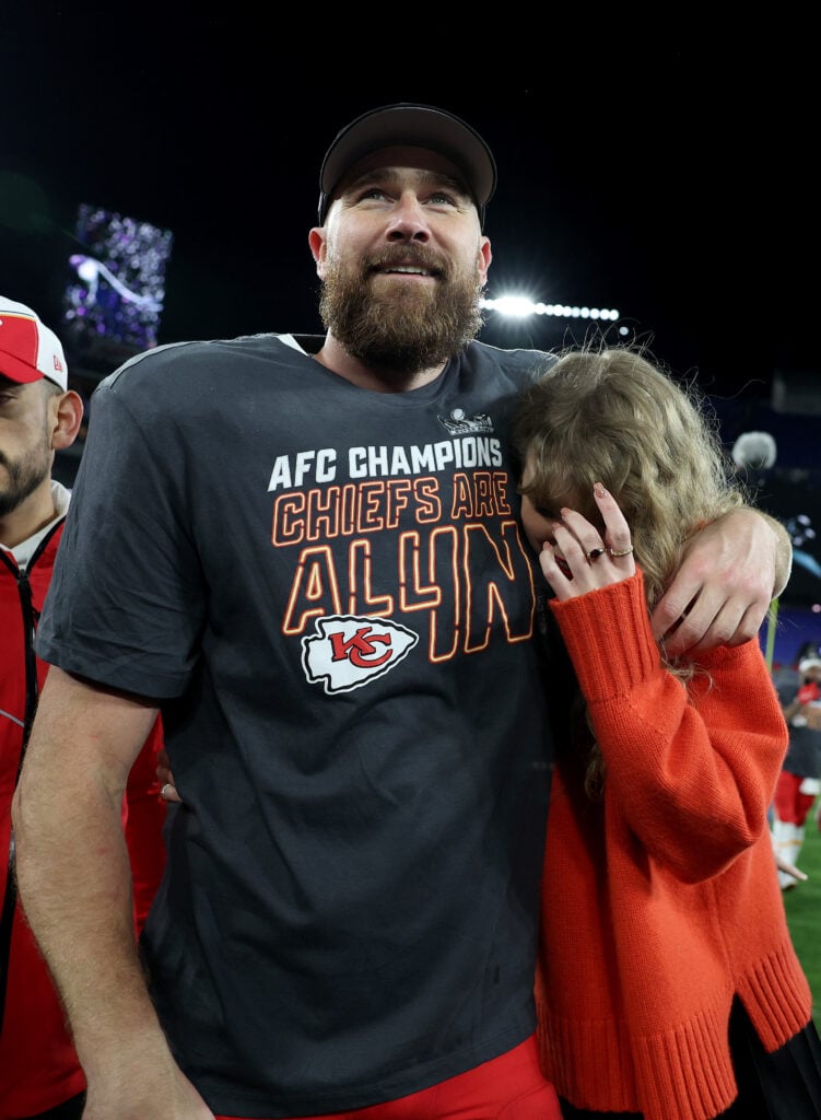 Travis Kelce #87 of the Kansas City Chiefs celebrates with Taylor Swift after a 17-10 victory against the Baltimore Ravens in the AFC Championship Game at M&T Bank Stadium on January 28, 2024 in Baltimore, Maryland. 