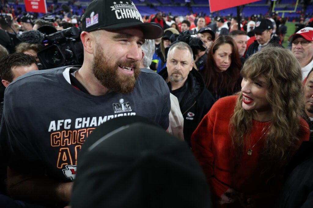 Travis Kelce #87 of the Kansas City Chiefs celebrates with Taylor Swift after a 17-10 victory against the Baltimore Ravens in the AFC Championship Game at M&T Bank Stadium on January 28, 2024 in Baltimore, Maryland. 