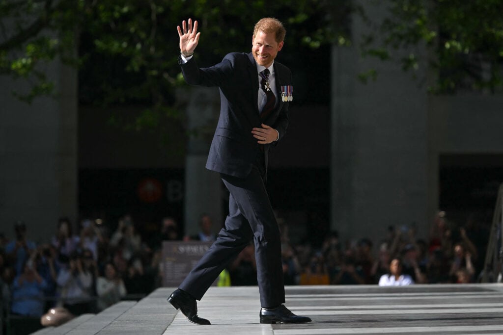 Prince Harry waves to fans