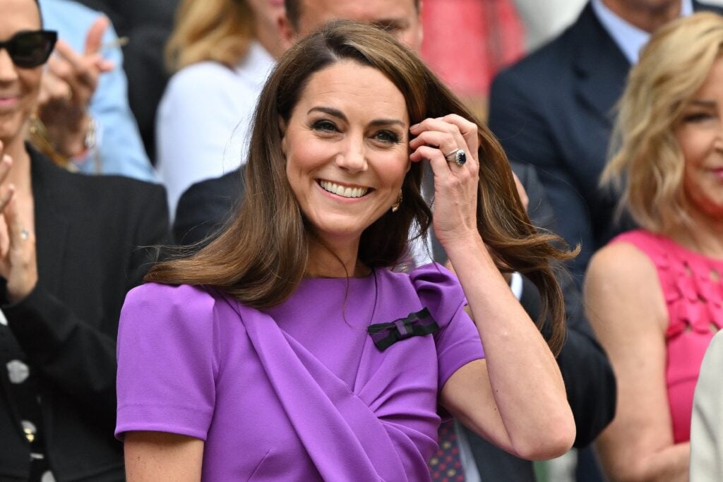 Catherine, Princess of Wales reacts as she arrives in the Royal Box on Centre Court to attend the men's singles final tennis match on the fourteenth day of the 2024 Wimbledon Championships. 