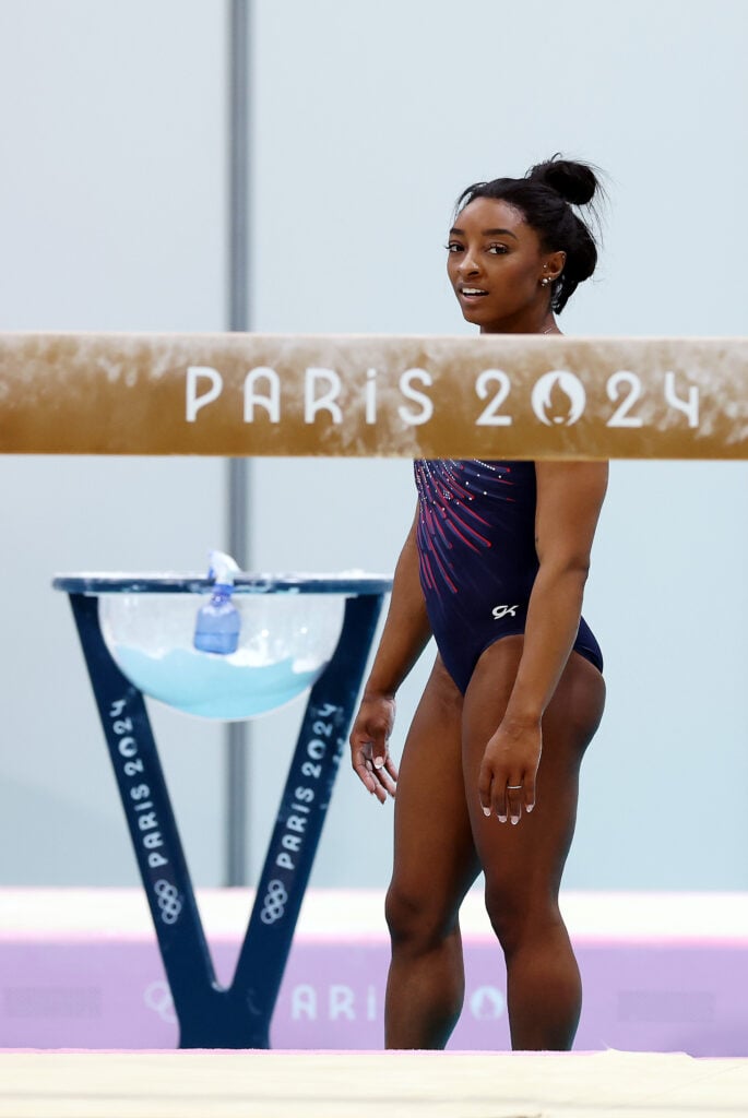 Simone Biles of the USA trains on the beam ahead of the Paris 2024 Olympic Games on July 24, 2024 in Paris, France. 