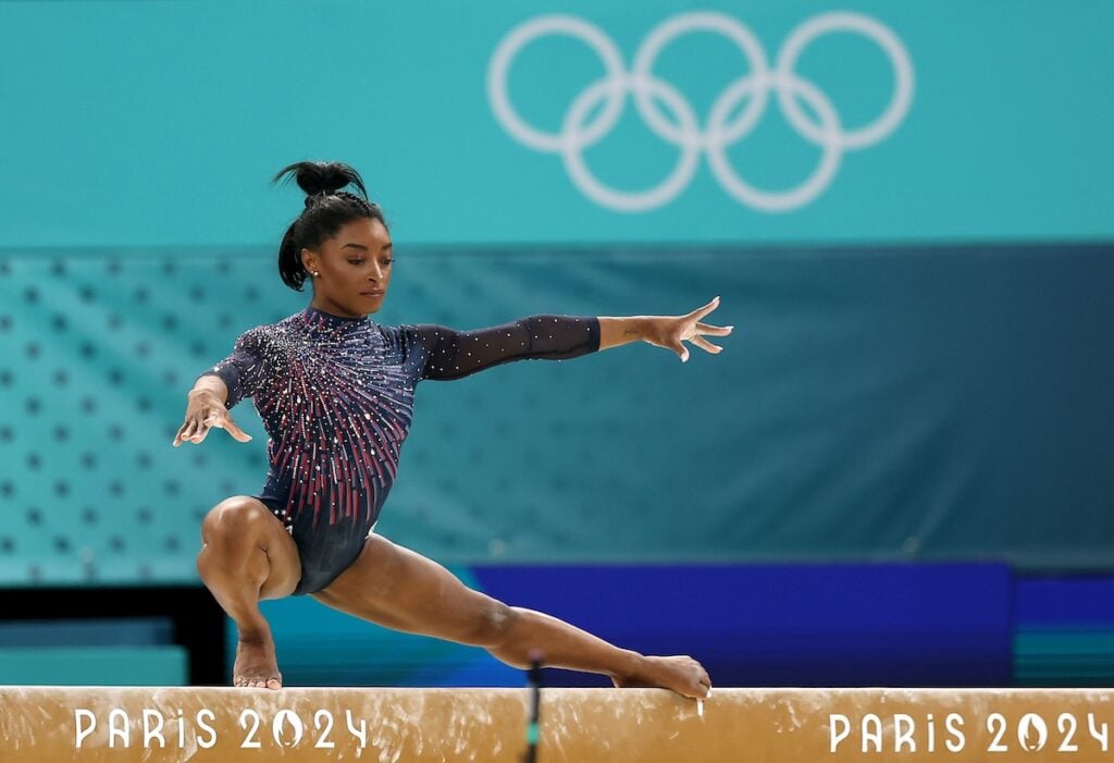  Simone Biles of Team United States practices on the balance beam during a Gymnastics training session in the Bercy Arena ahead of the Paris 2024 Olympic Games on July 25, 2024 in Paris, France. 