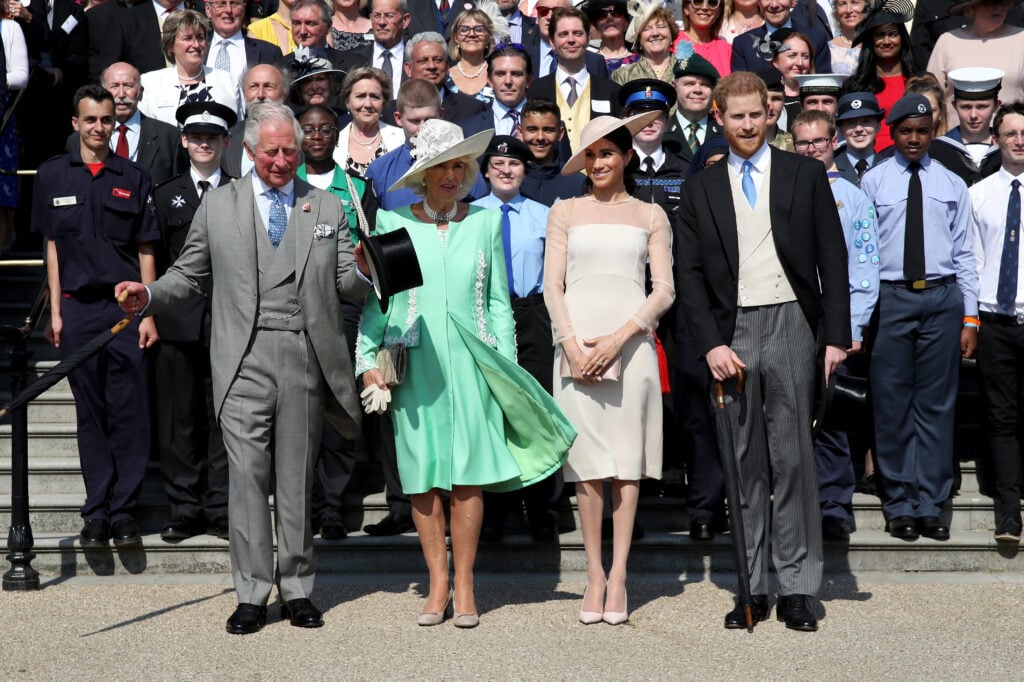 Prince Harry, Duke of Sussex, Prince Charles, Prince of Wales, Camilla, Duchess of Cornwall, Meghan, Duchess of Sussex and guests pose for a photograph as they attend The Prince of Wales' 70th Birthday Patronage Celebration held at Buckingham Palace on May 22, 2018 in London, England.  