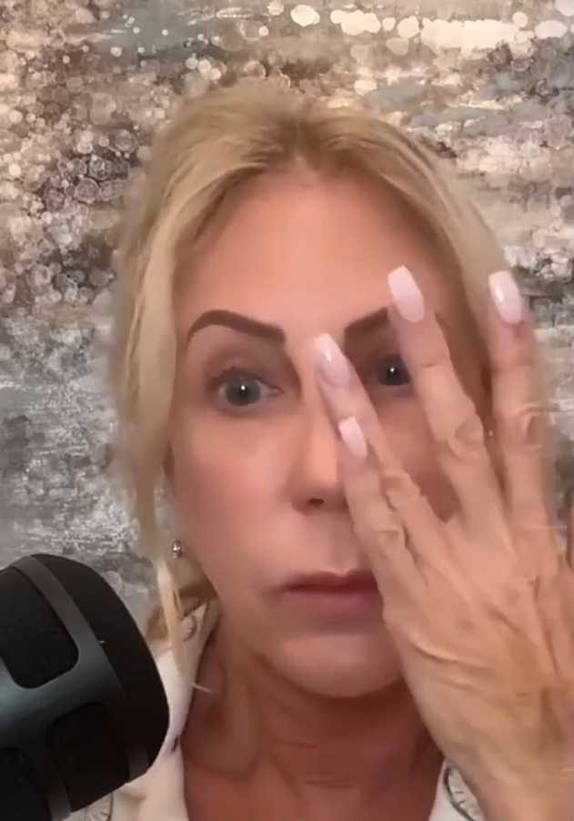 Vicki Gunvalson wipes her eye and looks worse for wear in an August 2024 podcast still.