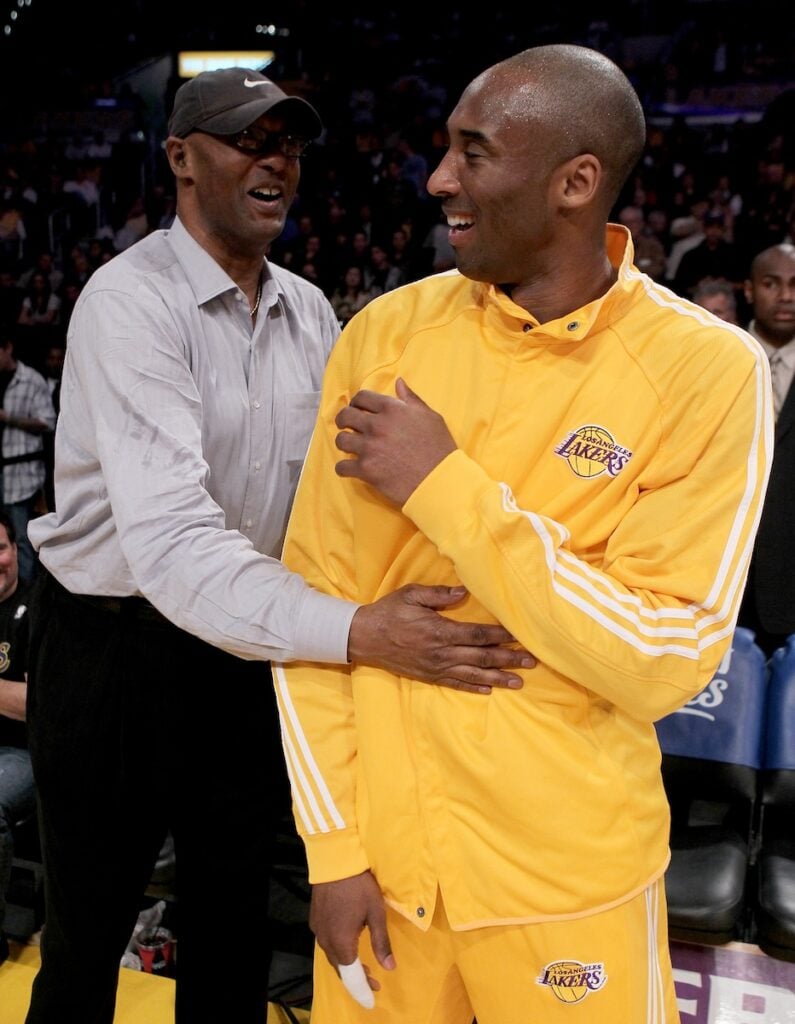 Kobe Bryant, with his father, during a game. 