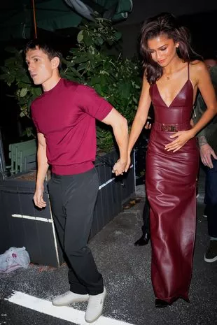 The Hollywood couple wore matching burgundy outfits